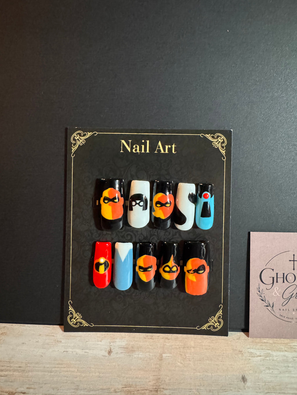 Red & Black Super Suit Press-On Nails | Comic Book Hero Hand-Painted Gel Nails